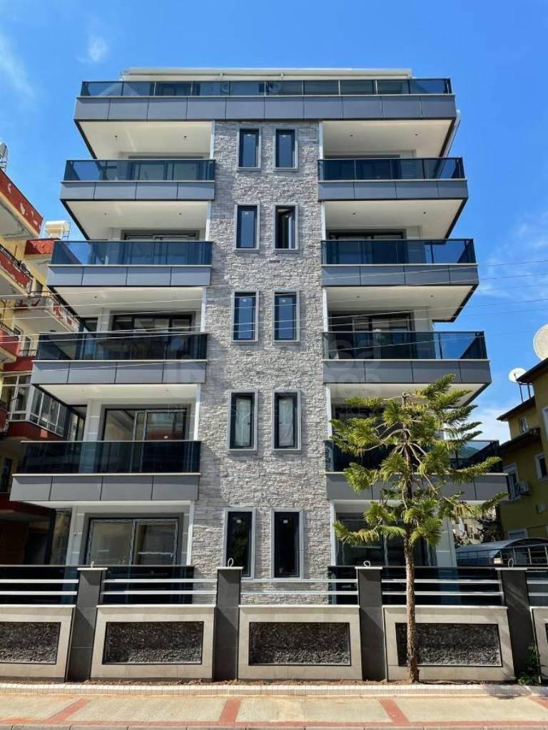 Furnished 4+1 penthouse duplex in GÜLLERPINARI close to the sea id 3511