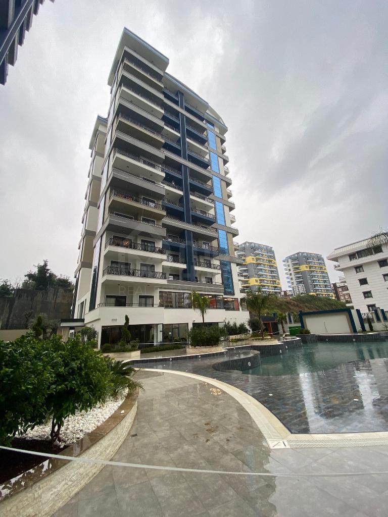 Furnished 1+1 apartment with a mountain view in Mahmutlar id 4612