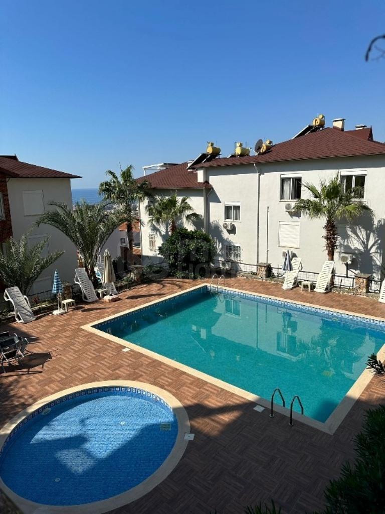 Alanya, Hasbahce. Furnished 2+1 apartment with a sea view id 5036