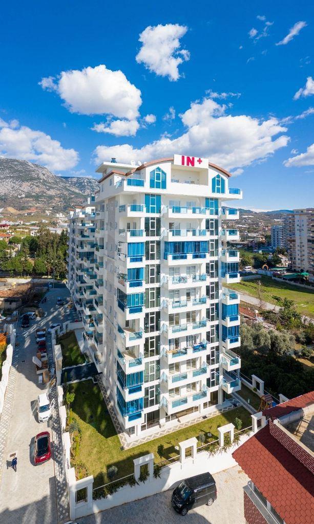 YEKTA IN + Furnished 2+1 duplex with a sea view in Mahmutlar id 6632